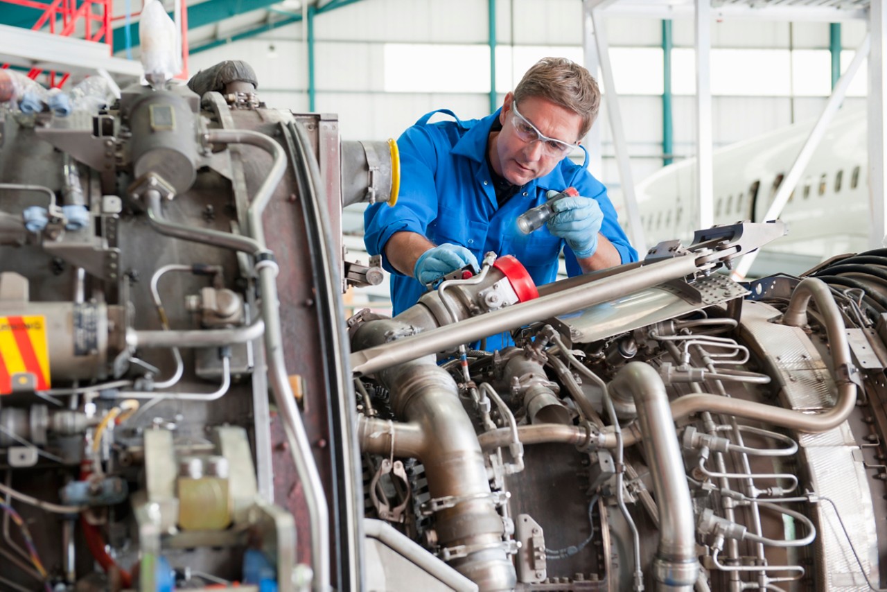 engineer-inspecting-aircraft-engine-getty-482175411.jpg